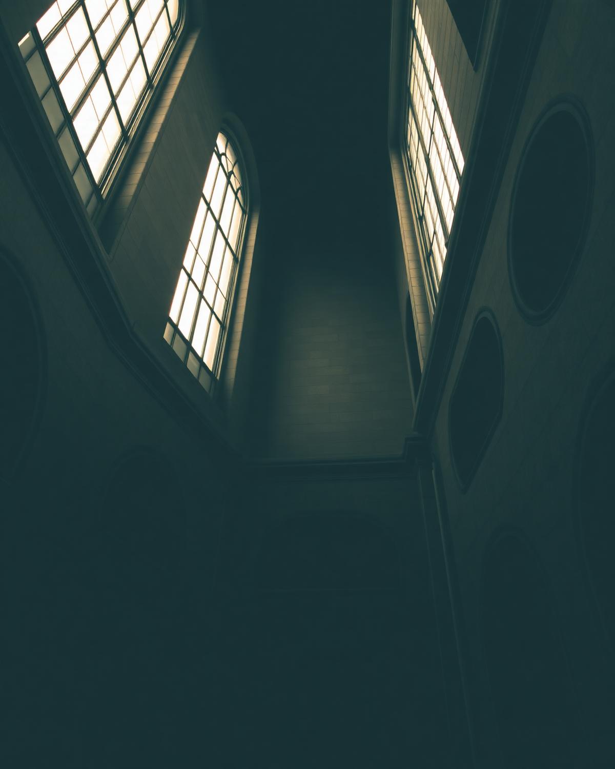 Federal courthouse interior with arched windows